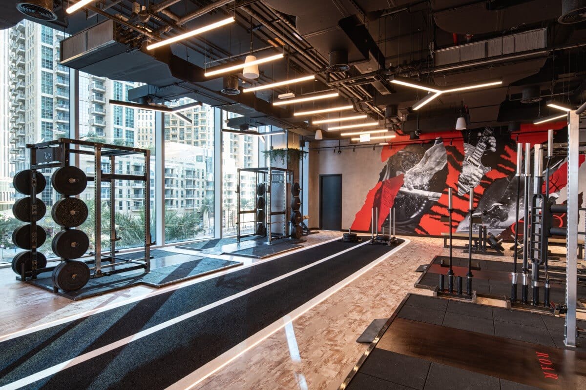 Roar Fitness Dubai studio interior with weights and equipment